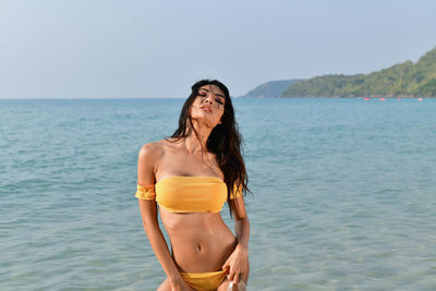 Young woman posing at beach