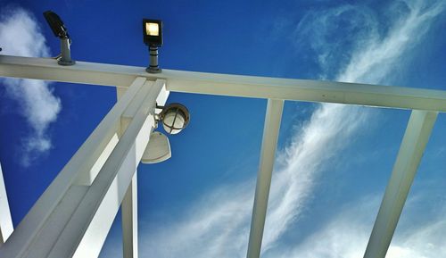 Low angle view of street light against sky