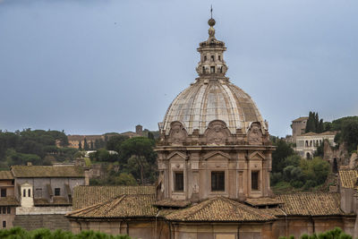 Cathedral of buildings against sky