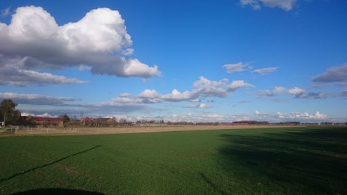 View of landscape against cloudy sky