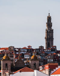 Buildings against clear sky in city