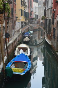 High angle view of boats moored in canal