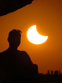 Low angle view of silhouette sun during sunset