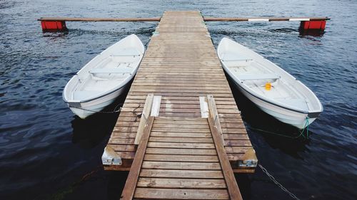 Boats moored at harbor