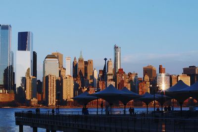 Skyscrapers in city against sky