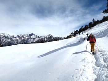 Scenic view of snow covered mountains