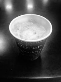 Close-up of coffee cup on table