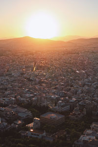 High angle view of townscape against sky during sunset