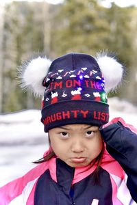 Portrait of cute girl in snow