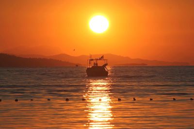 Scenic view of sunset over sea
