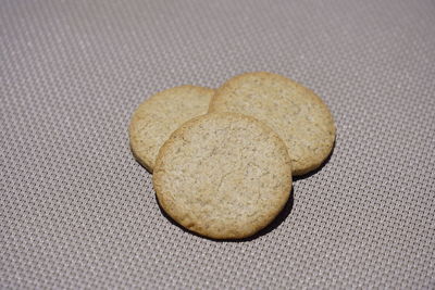 Close-up of cookies on white surface