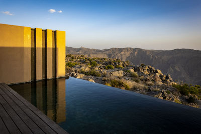 Scenic view of mountains against sky during sunset