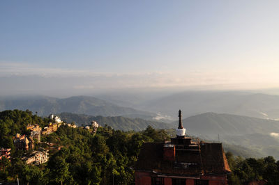 High angle view of mountains against blue sky