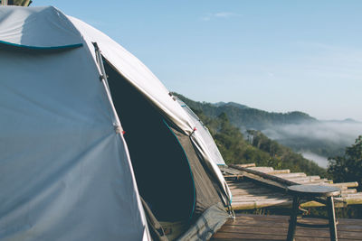 Tent on mountain against sky