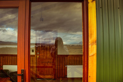 Reflection of sky on glass window