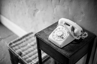 High angle view of telephone on table at home