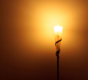 Close-up of illuminated light bulb