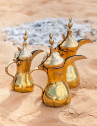 Arabic traditional coffee pots, hospitality drink in arabic culture, uae heritage concept