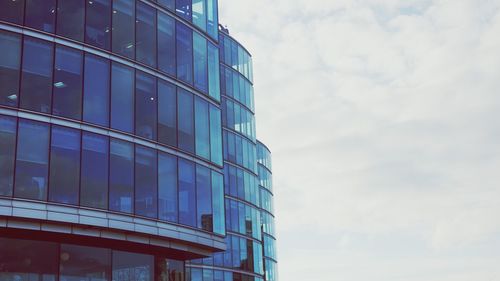 Low angle view of modern building against sky