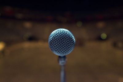 Close-up of microphone on stage