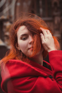 Close up smiling lady with red hair on street portrait picture