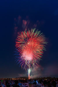 Firework display at night