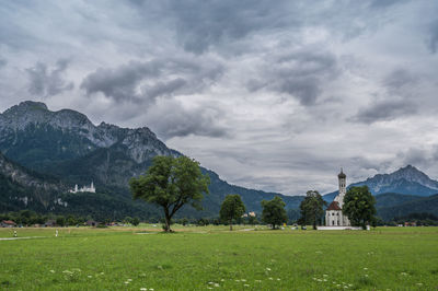 St. coloman church and famous neuschwanstein castle at schwangau, bayern, germany