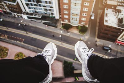 Person walking on road in city