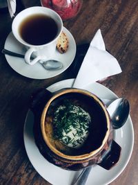 High angle view of coffee cup on table