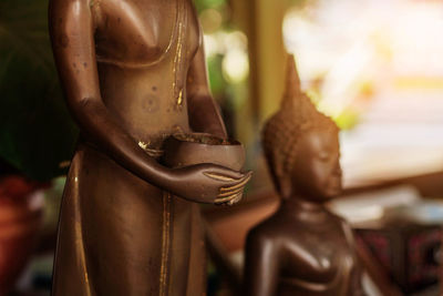 Close-up of buddha statues