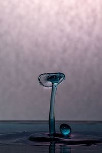 Close-up of water drop on table