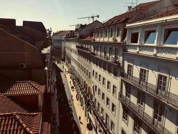 High angle view of street amidst buildings in town