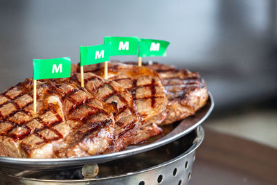 Close-up of meat on barbecue grill