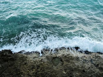 Close-up of waves splashing on shore