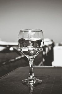 Close-up of wine in glass on table