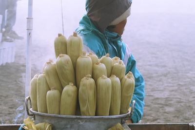 Man standing by corns