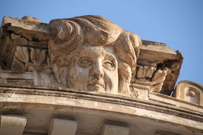 Low angle view of statue against clear sky