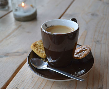 Close-up of coffee cup on table