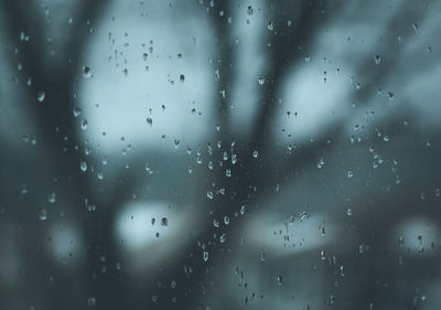 Close-up of water drops on glass