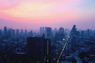 City lit up at sunset