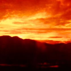 Scenic view of dramatic sky during sunset