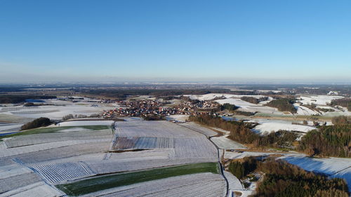 High angle view of river against clear blue sky