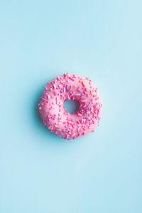 Pink apple against white background