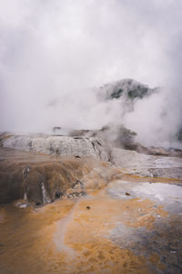 Smoke emitting from volcanic landscape