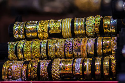 Close-up of bangles on stand for sale