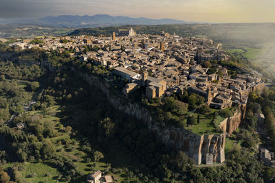 Oblique aerial view at sunset of the town of orvieto