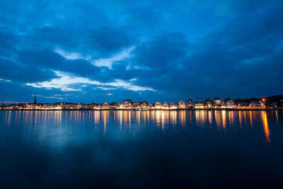 Scenic view of sea against sky at night