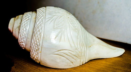 Close-up of seashell on table