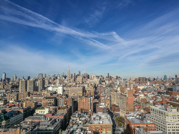 New york cityscape against sky