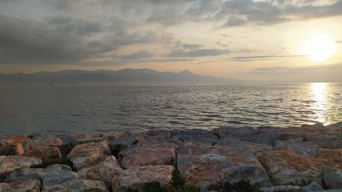 Scenic view of sea against sky during sunset